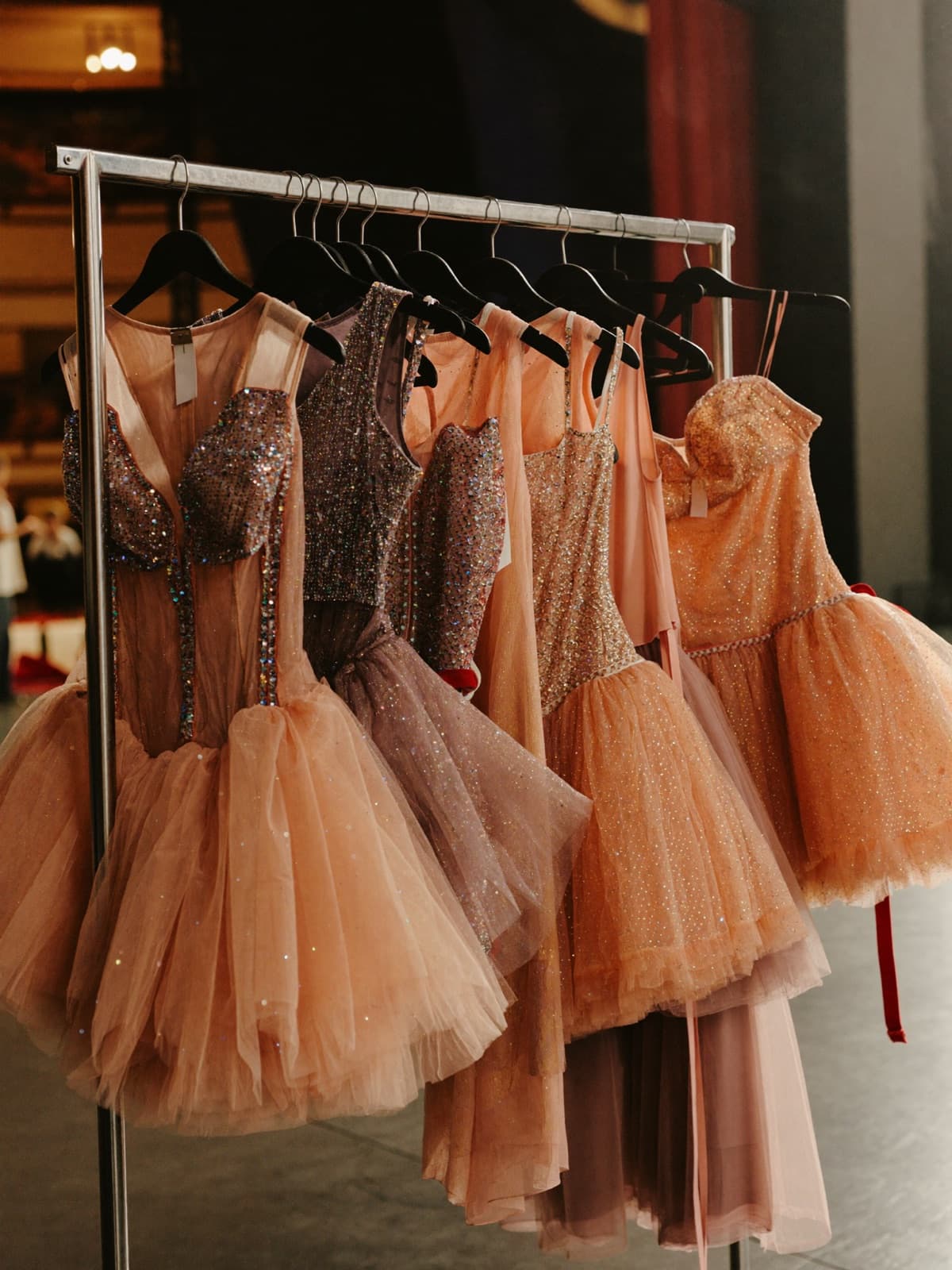 Rack of recital costumes waiting backstage